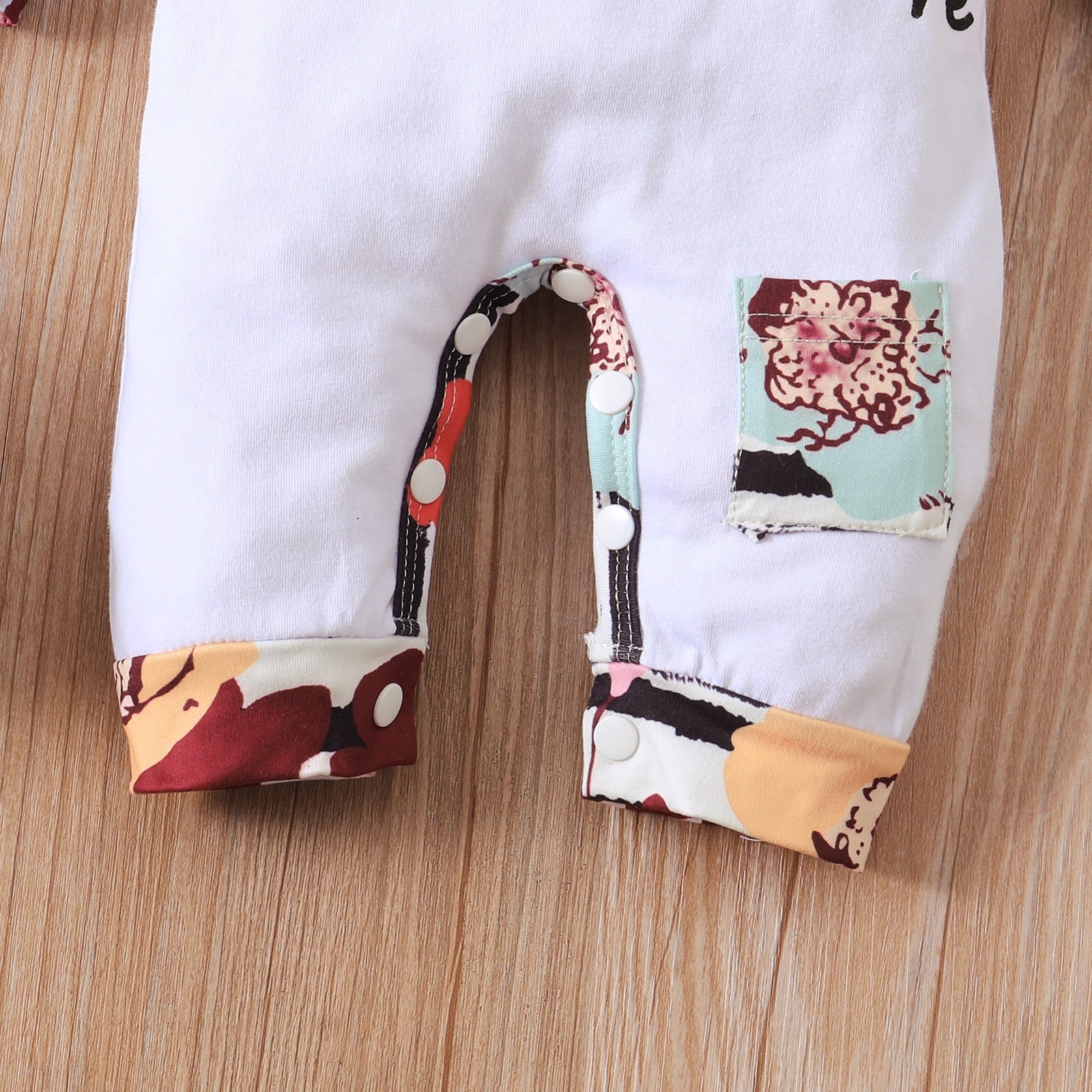 Macacão Infantil Feminino com Touca e Laço